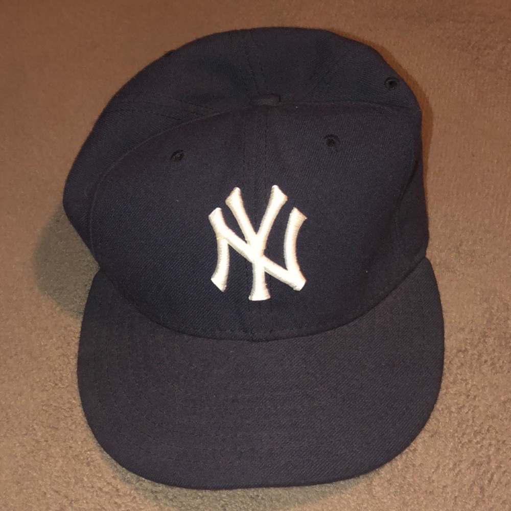 USED new yankees on-field cap.